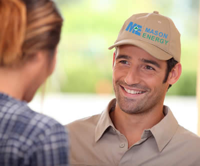 Heating contractor greeting homeowner.