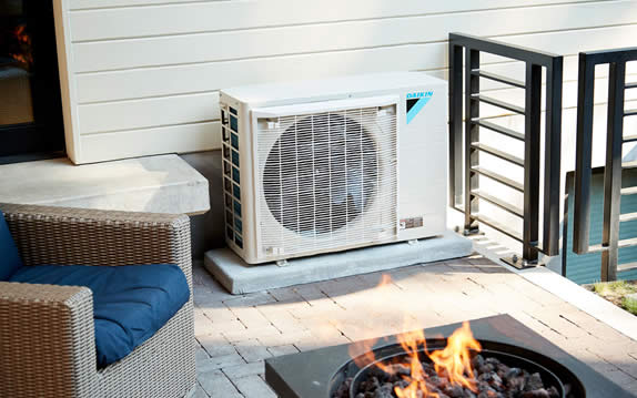 Daikin heat pump and Air conditioner in back yard deck